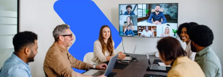 a group of people in a videocall in the office